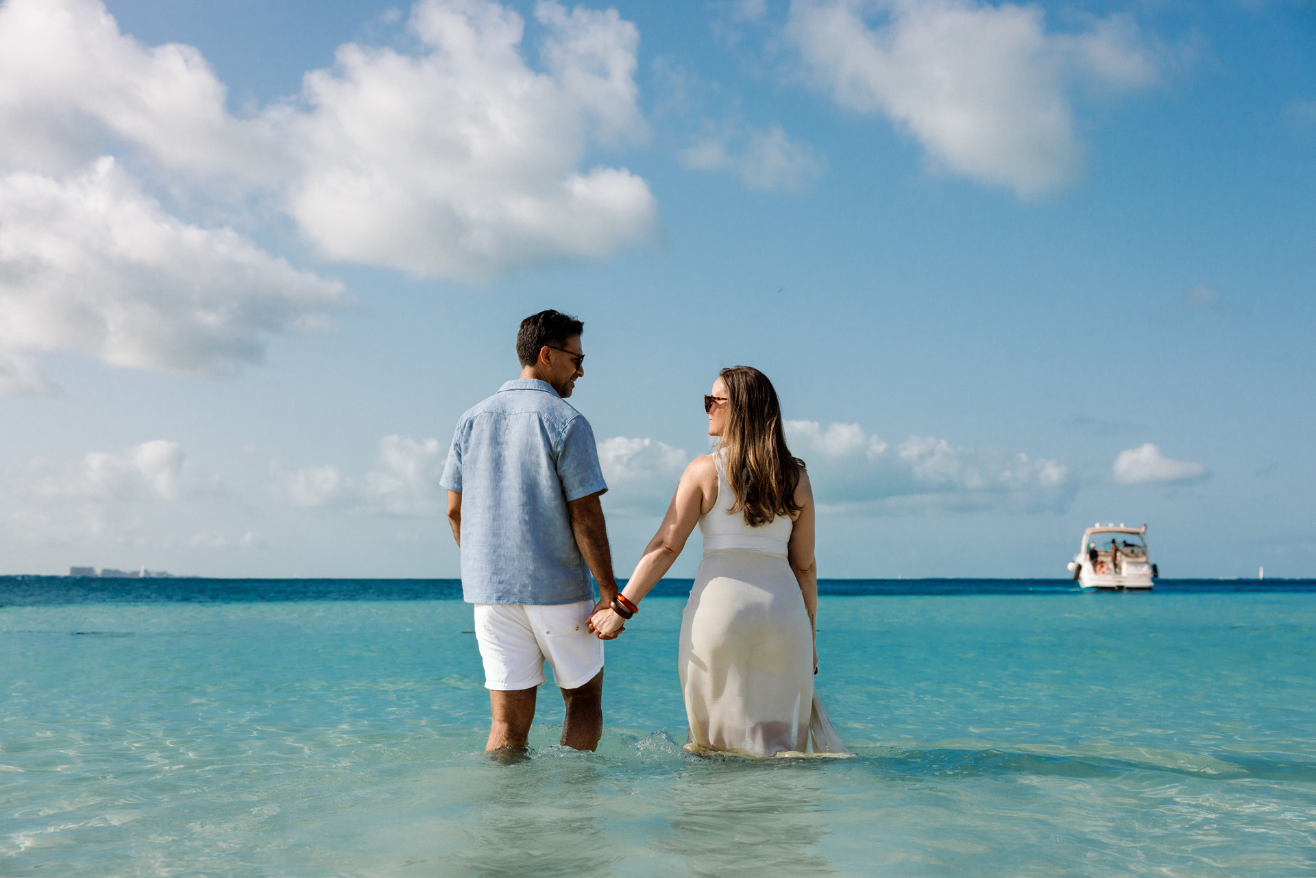 Couple in the ocean at Amàre Cancún resort