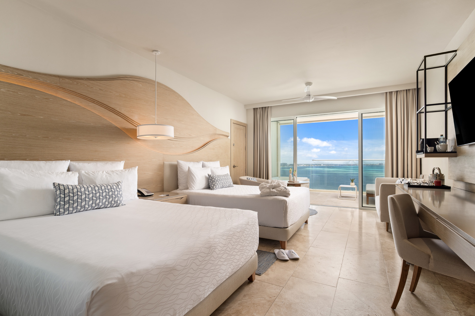 Amàre Cacún Junior Suite Ocean Front bedroom double queen