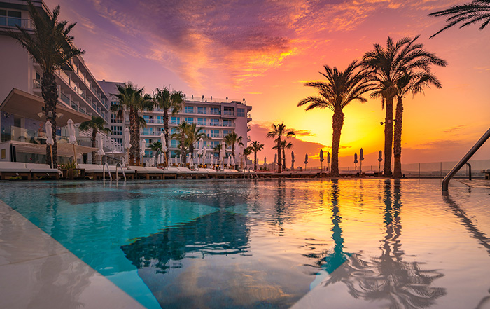 Amàre Beach Hotel Ibiza - Pool at sunset